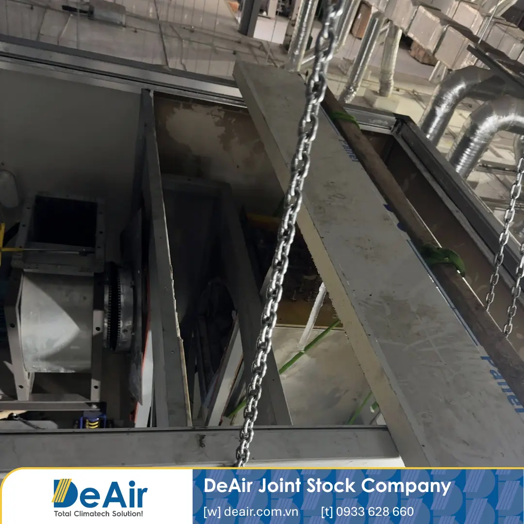 Surveying the client's desiccant rotor dehumidifier and its ceiling-mounted position