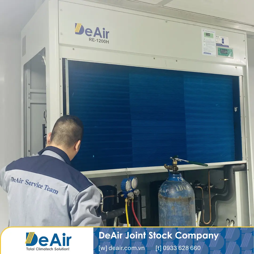 DeAir engineer dismantling the DeAir RE-1200H casing for coil cleaning