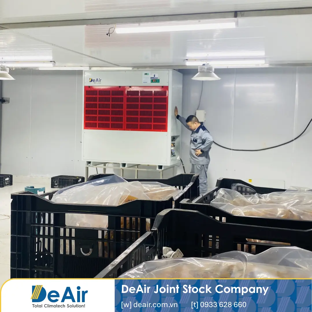 DeAir engineering specialist conducting electrical current and voltage testing on the control panel