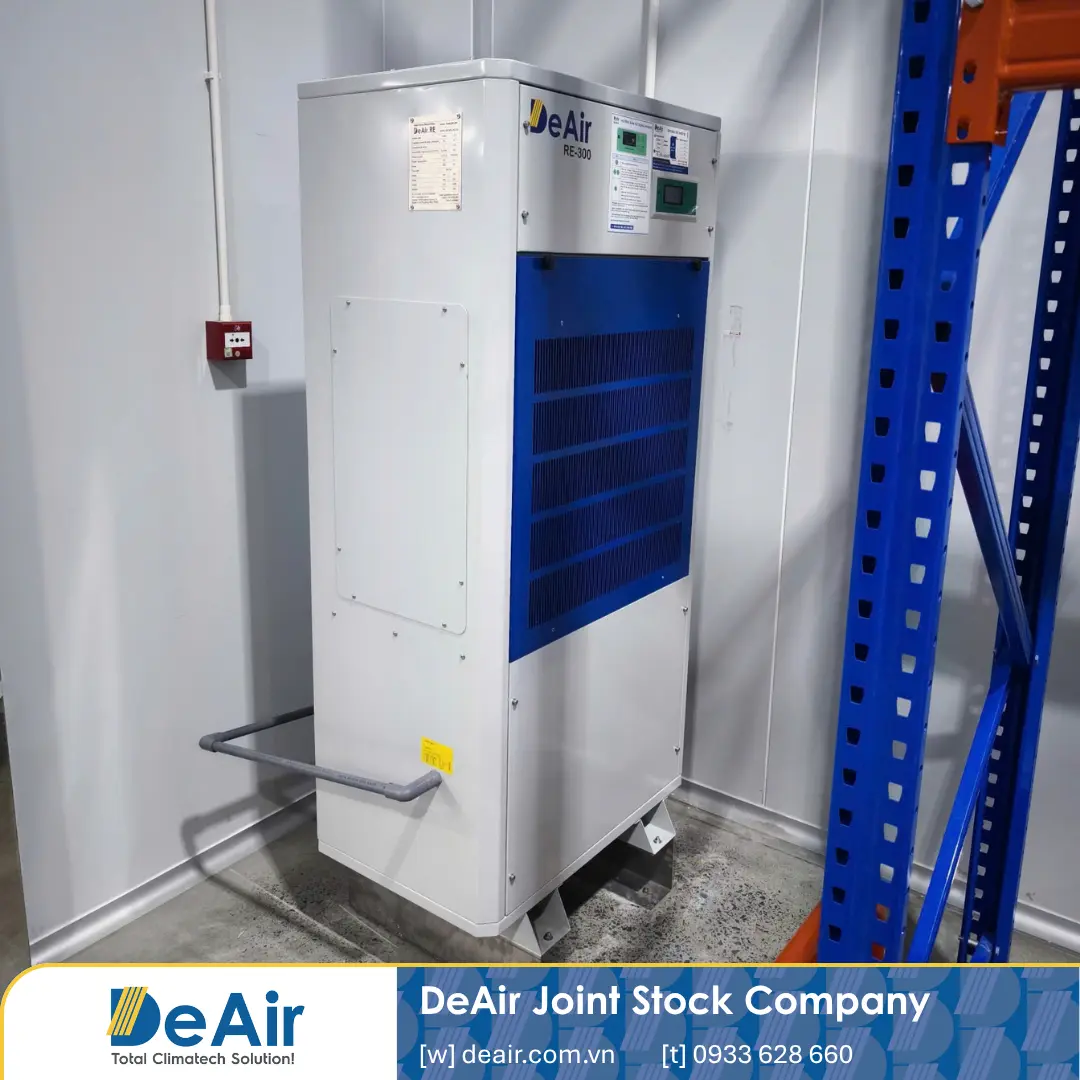 DeAir.RE-300 industrial dehumidifier placed in a corner