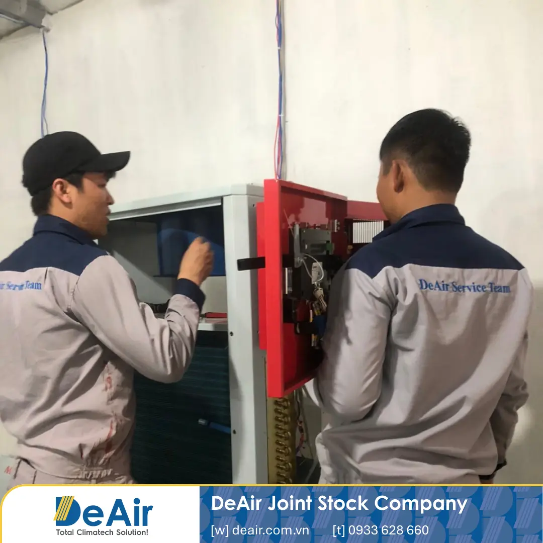 DeAir technicians carefully installing the Daxwell drying system