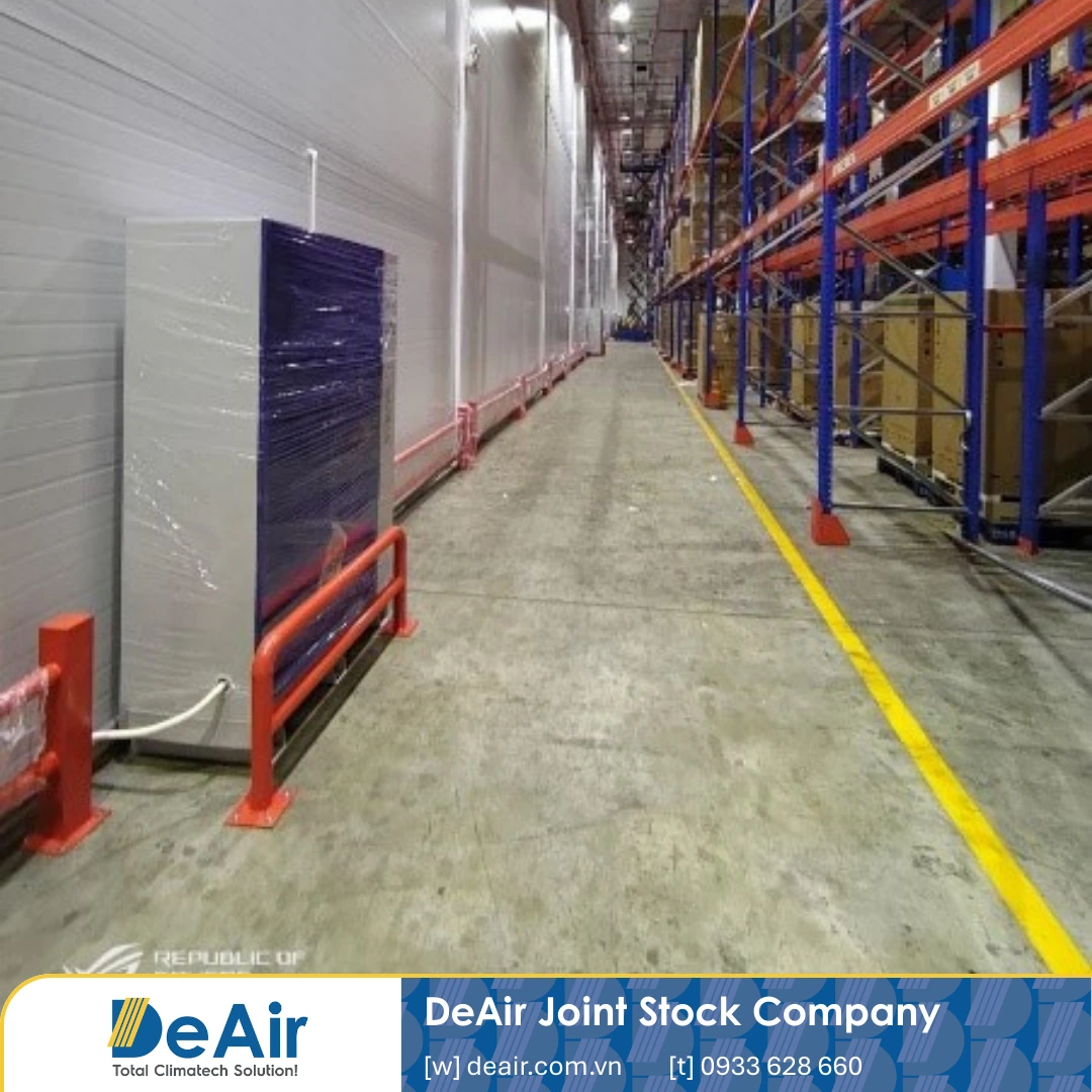 Portable industrial dehumidifier maintaining safe humidity levels in logistics warehouses